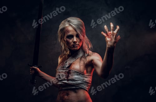 Preview: Naked Fantasy woman warrior wearing rag cloth stained with blood and mud in the heat of battle