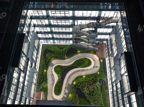 Preview: Courtyard garden of a high-tech company has a curved passage surrounded by transparent glass wall