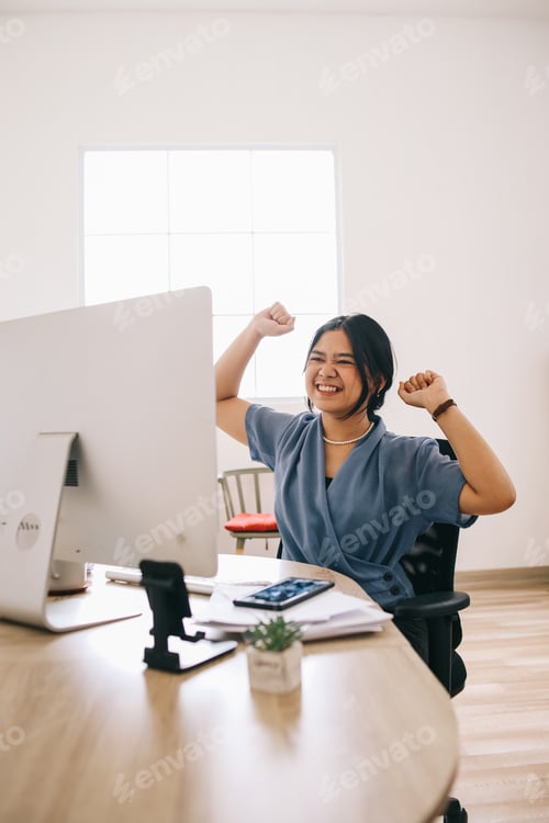 Preview: Businesswoman Celebrating Success