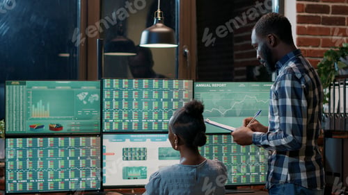 Preview: Team of bank traders using stock exchange sales statistics