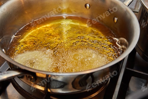 Preview: Cooking apple pancake. Apple donut in boiling oil.