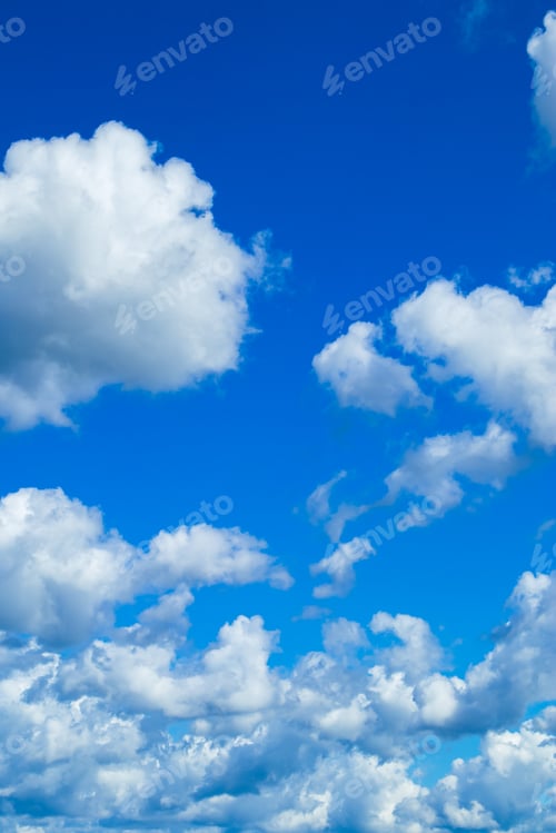 Preview: Beautiful summer blue sky. Fluffy white cumulus clouds.