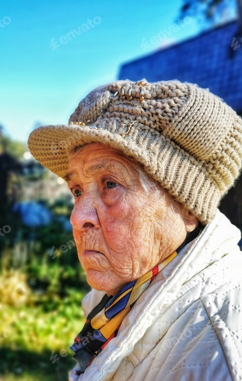 Preview: Senior Woman Relaxing Outdoors in Natural Light
