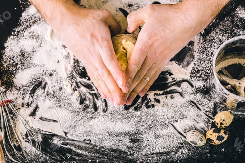 Preview: Hands kneading a dough