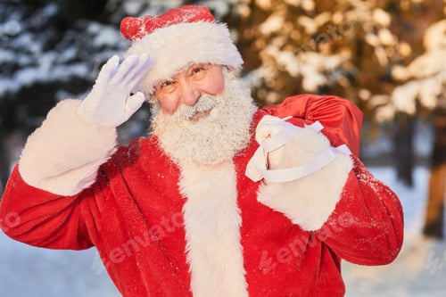 Preview: Santa Carrying Sack With Presents Outdoors
