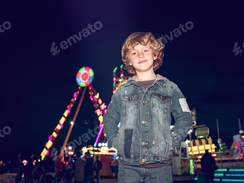 Preview: Excited little boy on funfair