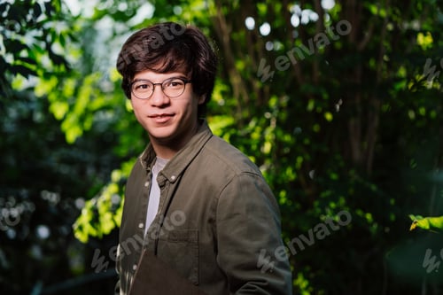 Preview: Nature protection concept. Male scientist looking at the camera