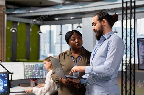 Preview: Teamworking programmers collaborating at work to train deep learning models