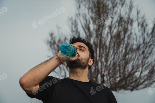 Preview: Athlete Refreshes With Water After A Hard Workout