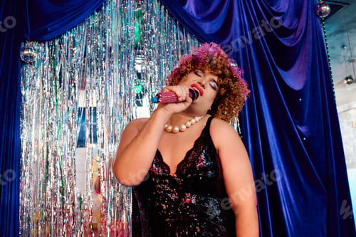 Preview: Eccentric drag queen captivates audience with bold performance during festive show