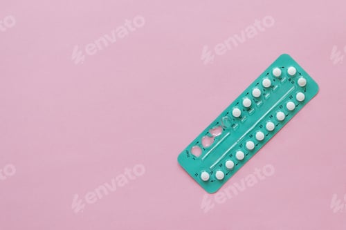 Preview: hormonal oral contraceptives in a blister for a month of reception lie on a table