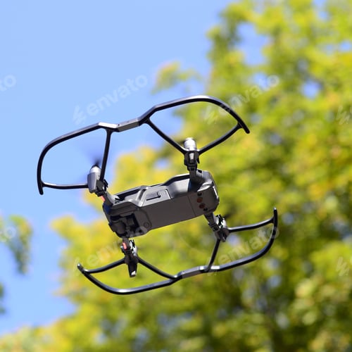 Preview: Drone with photocamera take off from land and flying for take aerial photo