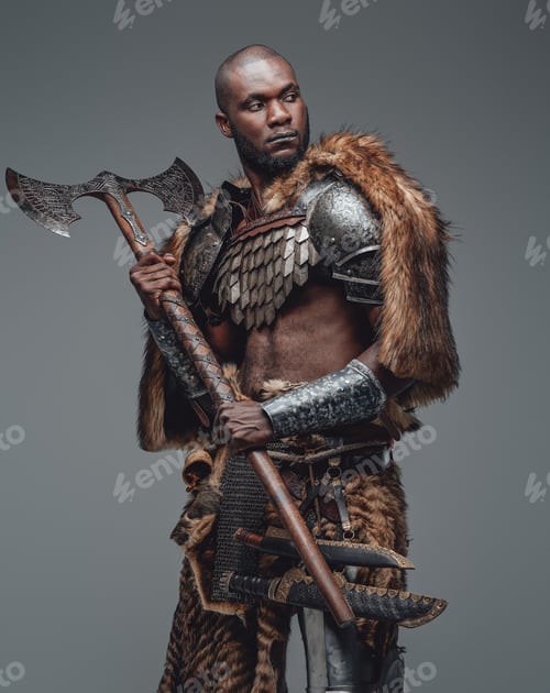 Preview: Proud warrior from the past in fur and armour holding a combat axe