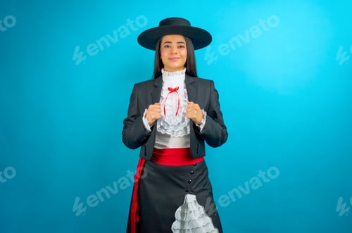 Preview: Confident latina woman proudly displaying traditional Huaso attire
