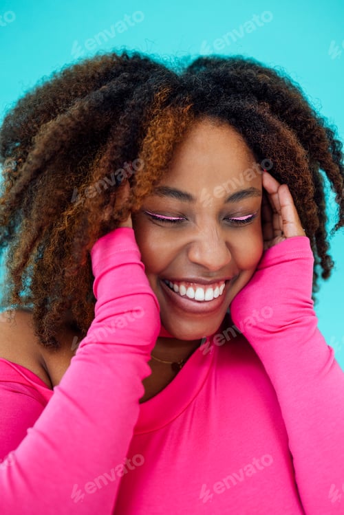 Preview: Dreamy young beautiful African American woman with bright eyelines wearing pink bodysuit