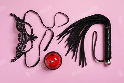 Preview: Different sex toys on pink background, flat lay