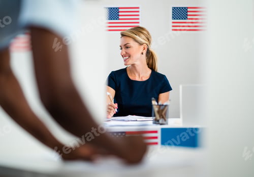 Preview: Member of electoral commission in polling place, usa elections