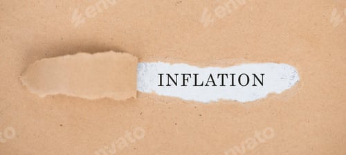 Preview: The word inflation is standing on a white background, ripped paper