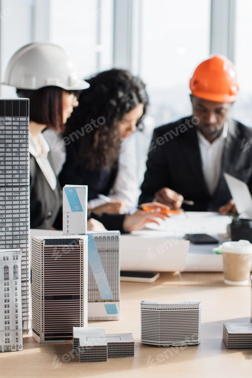 Preview: Architects Discussing Building Models