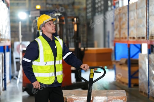 Preview: Young warehouse workers working together. Business distribution supply and logistic shipment.
