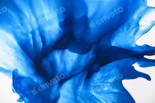 Preview: beautiful blue splashes of alcohol ink as abstract background