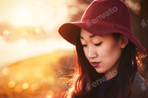 Preview: Asian Woman Outdoors At Sunny Day