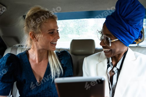 Preview: beautiful business women driving at the airport leaving on for a working travel