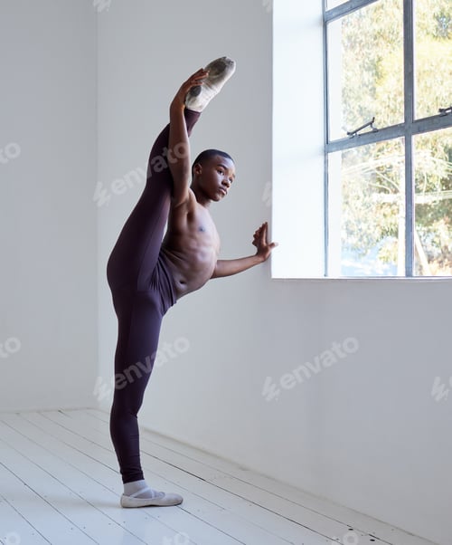 Preview: Keen and able. Shot of a young boy practicing his routine in a dance studio.