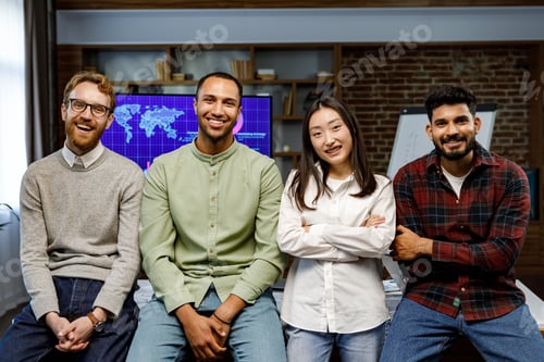 Preview: A team of young multinational business people are working on a startup. New generation of startups