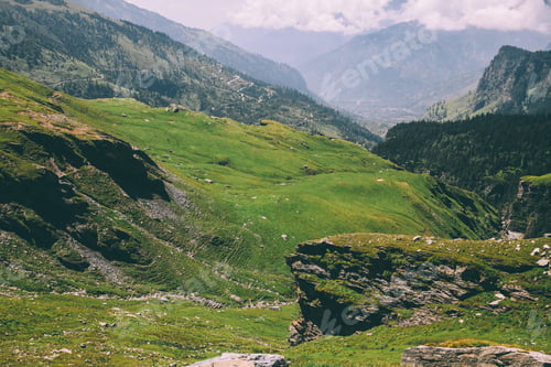 Preview: majestic rocky mountains covered with green grass and moss in Indian Himalayas, Rohtang Pass