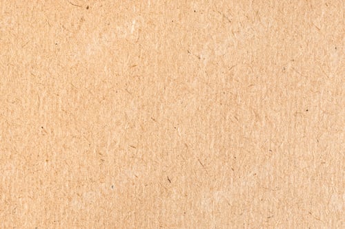 Preview: textured surface of old brown cardboard close up