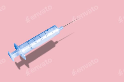 Preview: Creative pattern made with a syringe on blue background. new Corona virus infection