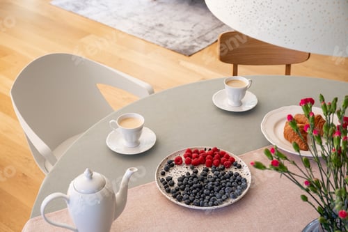 Preview: Real photo with high angle of dining table with fresh flowers, j