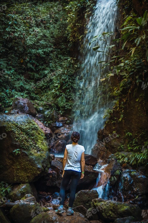 Preview: A young woman enjoying the Cascada del Cerro Azul Meambar National Park