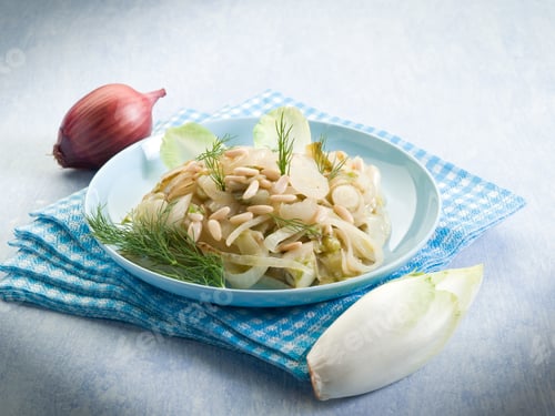 Preview: salad with sauteed endive onions and pine nuts