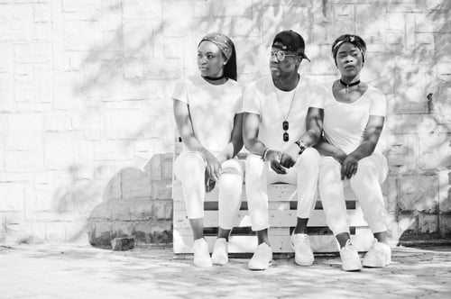 Preview: Stylish african american friends in white