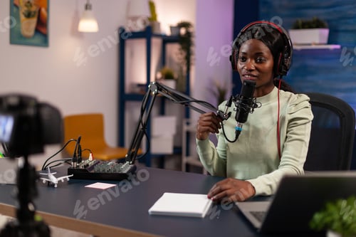 Preview: Social media influencer woman talking into production microphone