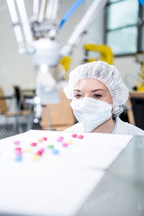 Preview: Woman watching robot handling sweets