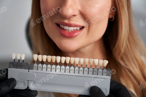 Preview: Woman having cosmetic dentistry at dentist’s office