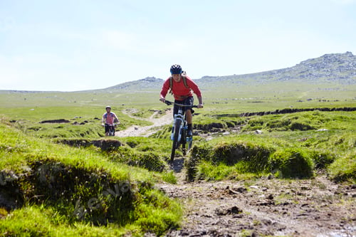 Preview: Cyclists cycling down hillside