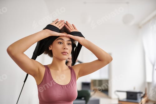 Preview: Graceful Woman Embracing Her Hair