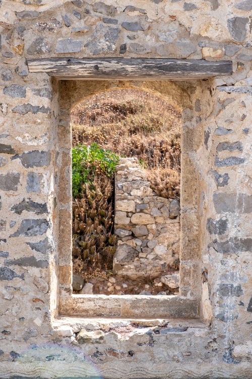 Preview: View of nature from framed window of Venetian Castle at Chora Kythira island, Greece.