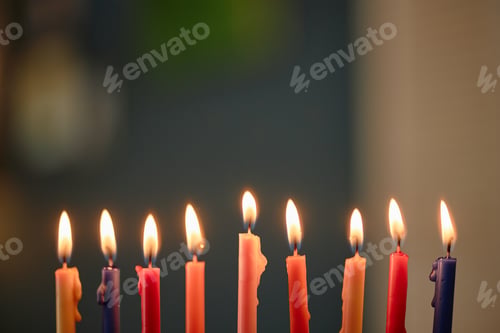 Preview: Colorful Hanukkah Candles Burning in Row Celebrating Jewish Holiday Tradition