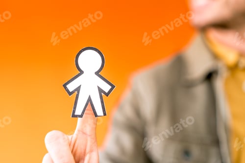 Preview: Smiling man holding funny paper toy