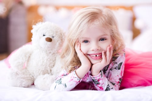 Preview: Beautiful smiling kid girl 3-4 year old wearing princess dress closeup. Looking at camera.