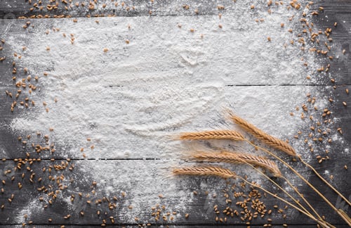 Preview: Baking concept on wood background, sprinkled flour with copy space