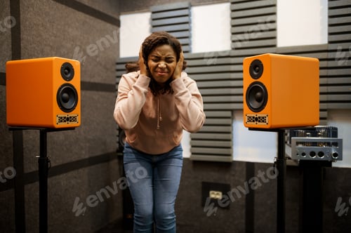 Preview: Woman listens to loud music, speaker system store