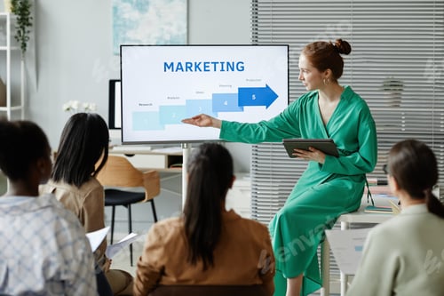 Preview: Businesswoman giving new info about marketing at training