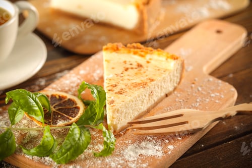 Preview: Cake Cheesecake Piece Rests On A Wooden Table