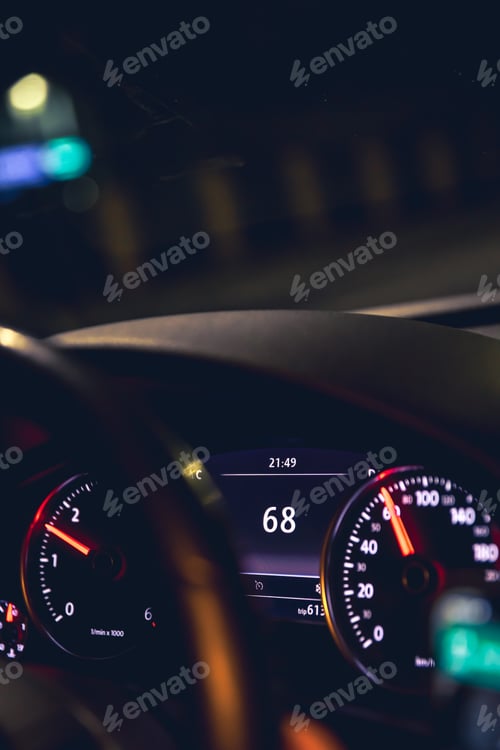 Preview: Close-up, car speed indicators in a car at night.